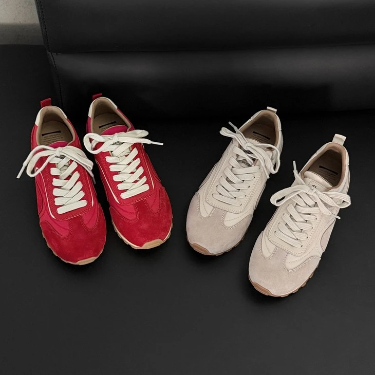 Red and off-white suede retro runner sneakers, both colourways