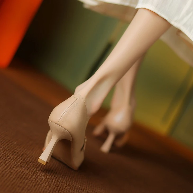 product-1-1 Slim tapered heel detail of apricot Mary Jane pumps